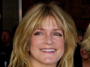 In this March 16, 2003 file photo, "Brady Bunch" cast member Susan Olsen appears at ABC's 50th Anniversary Celebration in Los Angeles. LA Talk Radio says Olsen has been fired after she got into an online confrontation with openly gay actor Leon Acord-Whiting. The station announced Friday, Dec. 9, 2016 that it will not tolerate hateful speech and that it has severed ties with Olsen. (AP Photo/Kevork Djansezian, File)
