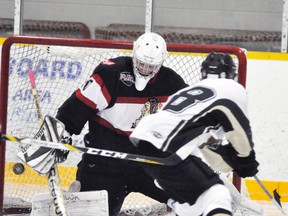 Mitchell Hawks’ goalie Graeme Lauersen makes this point blank stop during third period action of their Provincial Junior Hockey League (PJHL) game against visiting Mount Forest last Friday, Dec 9, a 4-1 Hawks’ win. ANDY BADER MITCHELL ADVOCATE