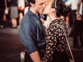Saya Tomioka kisses her boyfriend Griffin Madden after watching The Book of Mormon on Broadway in June 2015. Madden died earlier this month in an Oakland warehouse fire and Tomioka turned to Facebook to search for this photo. (Arken Avan Photo)
