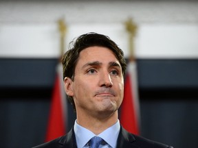 Prime Minister Justin Trudeau is pictured at an Ottawa  press conference on Dec. 12. (THE CANADIAN PRESS)