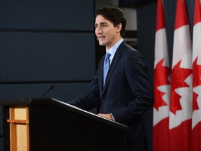 Prime Minister Justin Trudeau holds a press conference at the National Press Theatre in Ottawa on Monday, Dec. 12, 2016. THE CANADIAN PRESS/Sean Kilpatrick