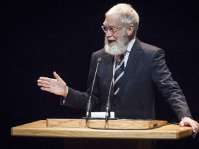 In this Nov. 30, 2015 file photo, David Letterman sports a long white beard as he speaks at Ball State University in Muncie, Ind.  (Corey Ohlenkamp/The Star Press via AP, File)