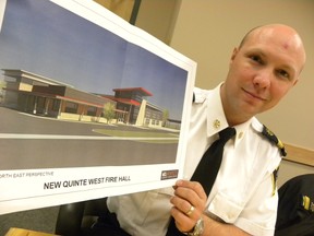 Ernst Kuglin/Intelligencer file photo
Quinte West deputy fire chief Dan Smith displays a picture of the city’s new fire hall. The city was criticized for the facility’s lack of an elevator, but the design is now being reworked to include one.