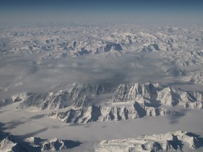 The Arctic shattered heat records in the past year, as unusually warm air triggered massive melting of ice and snow and a late fall freeze, U.S. government scientists said December 13, 2016. The grim assessment came in the Arctic Report Card 2016, a peer-reviewed report by 61 scientists around the globe that is issued by the National Oceanic and Atmospheric Administration. (HANDOUT/AFP/Getty Images)
