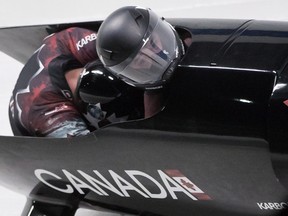 Canada's Nick Poloniato (right) and Derek Plug (left) compete in a world cup two man bobsleigh race in Whistler, B.C., on Dec. 2, 2016. The International Bobsleigh and Skeleton Federation has dumped Sochi as the host of the upcoming 2017 world championships on Tuesday, Dec. 13, 2016. (Darryl Dyck/The Canadian Press)