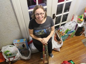 Cricket Scott has been collecting donations of toys, clothes, and food for a Christmas Cheer project put on by two Facebook groups for moms. Members from these groups are supporting 12 local families, and three other mothers, during the holiday season. (MEGAN STACEY/Sentinel-Review)