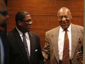Bill Cosby laughs as he exits the elevator as he returns to court for a pretrial hearing in his sexual assault case at the Montgomery County Courthouse in Norristown, Pa., on Dec. 13, 2016. (David Maialetti/The Philadelphia Inquirer via AP, Pool)