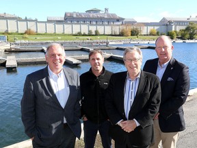 Kingston citizens trying to start a project to re-develop the Kingston Penitentiary site and build a sail training centre among other ideas from left, George Hood, John Curtis, Harvey Rosen and George Jackson on Friday. (Ian MacAlpine /The Whig-Standard)