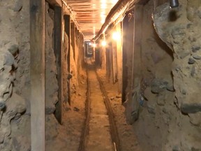 This frame grab taken from a Monday, Dec. 12, 2016 video provided by the Mexican Attorney General's Office, or PGR, shows one of two tunnels found in an area of warehouses in the border city of Tijuana that lead into California. Prosecutors said Monday that one of the tunnels led into San Diego, California, and the other was unfinished. The Attorney General’s Office said the tunnels were apparently used by the Sinaloa drug cartel to move drugs into the United States. (Mexico's Attorney General's Office via AP)
