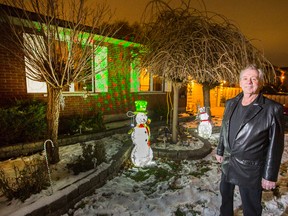 John A. MacDonald stands outside his home (Postmedia)