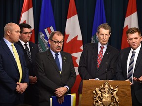 Opposition Leaders, left, Alberta Party Greg Clark , Progressive Conservative Ric Mclver, Liberal David Swann and Wildrose Brian Jean held a joint news conference to present terms of reference that are essential for opposition members to participate in the government-led child intervention panel in Edmonton, Tuesday, December 13, 2016. Ed Kaiser/Postmedia