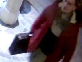 Toronto Police released this image of a man sought in a theft during Sunday mass at St. Michael's Cathedral on Dec. 11.