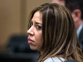 Dalia Dippolito sits with her defense team after the jury was sent home after failing to reach a verdict in here murder-for-hire retrial on Dec. 13, 2016, in West Palm Beach, Fla. (Lannis Waters/Palm Beach Post via AP, Pool)