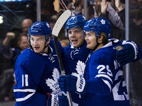 Toronto Maple Leafs Auston Matthews (centre) celebrates a goal against the San Jose Sharks with Zach Hyman and William Nylander at the ACC in Toronto on Tuesday, December 13, 2016. (Craig Robertson/Toronto Sun)