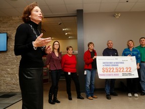 Emily Mountney-Lessard/The Intelligencer
United Way executive director Judi Gilbert addresses Procter and Gamble employees after the plant's United Way fundraising committee members announce the amount of funds raised during the annual campaign on Wednesday in Belleville. They collected a total of $522,522.22.