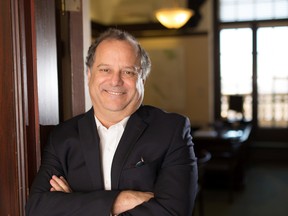 Brian Topp, chief of staff to Premier Rachel Notley, poses for a photo in the doorway to his office in the Alberta Legislature in Edmonton on November 26, 2015.