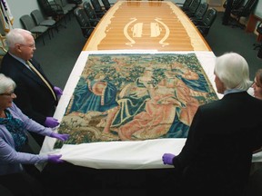This Nov. 7, 2016 image from video provided by HISTORY Canada & More4 shows a 16th century tapestry at the National WWII Museum in New Orleans that had been in Adolf Hitler’s retreat in the Bavarian Alps. (HISTORY Canada & More4 via AP)