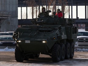 Rheanna Trepanier, the ten year old Edmonton girl with four brain tumors was given the opportunity to ride in a LAV VI as well as hold a  bazooka and other types of weapons used by the military at CFB Edmonton on Wednesday, December 14, 2016 in Edmonton. Greg Southam / Postmedia