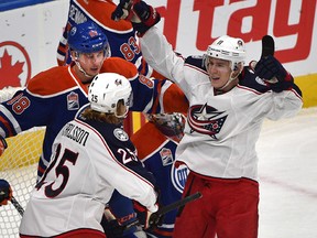 Oilers players react as the Blue Jackets celebrate Matt Calvert's goal Tuesday at Rogers Place. (Ed Kaiser)