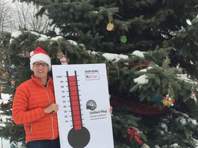 Richard Kelch, chairperson for the 2016 campaign for the United Way of Sarnia-Lambton, makes note that the organization this week reached its $2-million fundraising objective. Submitted photo