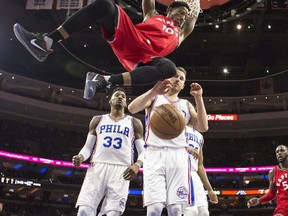 DeMar DeRozan slams down a dunk against the Philadelphia 76ers. AP