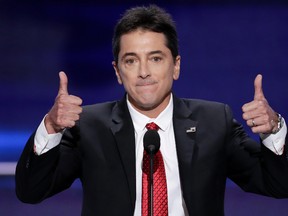 Actor Scott Baio gives two thumbs up after addressing the delegates during the opening day of the Republican National Convention in Cleveland on July 18, 2016. (AP Photo/J. Scott Applewhite)