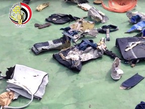 This still file image taken from video posted May 21, 2016, on the official Facebook page of the Egyptian Armed Forces spokesman shows some personal belongings and other wreckage from EgyptAir flight 804. (Egyptian Armed Forces via AP)