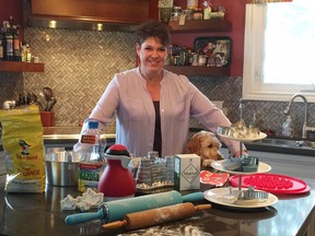 Lisa Miettinen, CEO/chief librarian of Oxford County Library, shows off some of the items in the new Kitchen Lending Library. That collection includes everything from a Darth Vader cake pan to a vegetable spiralizer to a breadmaker. (Submitted)