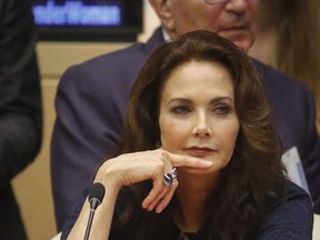 In this Oct. 21, 2016 file photo, Lynda Carter, who played Wonder Woman on television, listens during a UN meeting to designate Wonder Woman as an "Honourary Ambassador for the Empowerment of Women and Girls." Rhéal LeBlanc, the head of press and external relations, said  Dec. 13 that the appointment of Wonder Woman as an Honourary Ambassador for the Empowerment of Woman and Girls would end this week. (AP PHOTO)