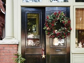 A classic Christmas means decorating with red, gold and green like this antler and berry wreath from Homesense.