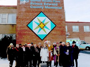 BRUCE BELL/THE INTELLIGENCER
Prince Edward County Memorial Hospital is the latest addition to the PEC Barn Quilt Trails. The new quilt was unveiled Thursday afternoon with members of the Marysburgh Mummers, Prince Edward County Memorial Hospital Foundation, PEC Barn Quilt Trails and County council on hand.