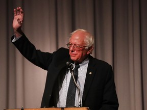 Former presidential candidate and Vermont Senator Bernie Sanders waves to the audience gathered to hear him speak at The Cooper Union on Dec. 13, 2016 in New York City. (Spencer Platt/Getty Images)