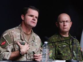 Commander of Canadian Special Operations Forces, Major General Mike Rouleau (left) and Lieutenant General Stephen Bowes (right), Commander of the Canadian Joint Operations hold a news conference in Ottawa to give an update on Canada's ongoing strategy to counter Daesh in Iraq. (THE CANADIAN PRESS/Fred Chartrand)