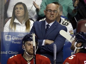 Panthers interim head coach Tom Rowe watches during third period NHL action against the Penguins in Sunrise, Fla., on Dec. 8, 2016. (Lynne Sladky/AP Photo)