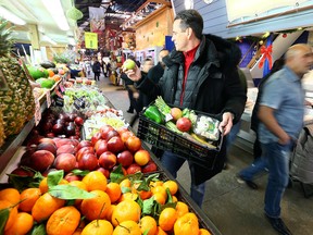 Chef Jagger Gordon, founder of Feed Families, at St. Lawrence Market on Dec. 15, 2016. (Dave Abel/Toronto Sun)