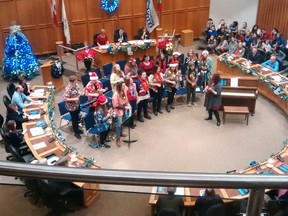 Student musicians from Parkside Collegiate Institute bring Mele Kalikimaka season's greetings Tuesday to Thames Valley District School Board's inaugural meeting for the coming year.