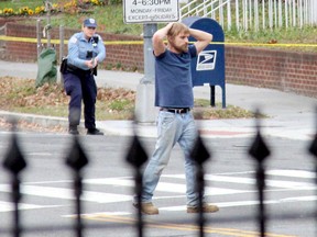 In this Dec. 4, 2016, file photo, Edgar Maddison Welch, 28 of Salisbury, N.C., surrenders to police in Washington. (Sathi Soma via AP, File)