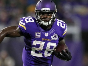 In this Sept. 18, 2016, file photo, Minnesota Vikings running back Adrian Peterson carries the ball during the first half of an NFL football game against the Green Bay Packers, in Minneapolis. (AP Photo/Andy Clayton-King, File)