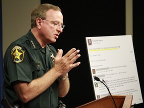 Polk County Sheriff Grady Judd talks during a 2013 press conference. (AP Photo/The Ledger, Calvin Knight)