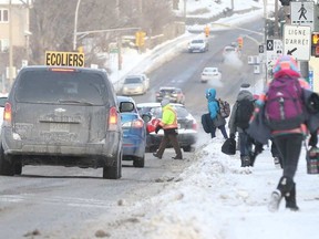 Students of École Jean-de-Brébeuf at 360 Boulevard de Lucerne in Gatineau leave school on December 16, 2016. JEAN LEVAC / POSTMEDIA NEWS