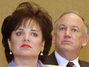 In this May 24, 2000 file photo, Patsy Ramsey and her husband, John, parents of JonBenet Ramsey, look on during a news conference in Atlanta regarding their lie-detector examinations for the murder of their daughter. (AP Photo/Ric Feld, File)