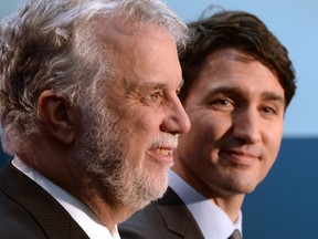 Prime Minister Justin Trudeau and the Premier of Quebec Philippe Couillard take part in an infrastructure announcement in Montreal, Friday December 16, 2016. (THE CANADIAN PRESS/Ryan Remiorz)