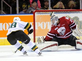 Victor Mete of the Knights scores their only tally of the first period on a powerplay putting a nice pass behind Guelph Storm goalie Liam Herbst Friday night at Budweiser Gardens in London. (MIKE HENSEN, The London Free Press)