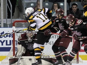 Kingston Frontenacs' Justin Pringle looks for a rebound in front of  Peterborough Petes goalie Dylan Wells during Ontario Hockey League action at the Rogers K-Rock Centre on Friday. (Ian MacAlpine/The Whig-Standard)