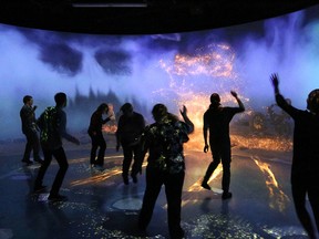 Science North staff members participate in the new immersive multimedia object theatre that premiered at the science centre in Sudbury on Friday. Ready, Set, Move! was created by Science North in partnership with Experimentarium science centre in Copenhagen, Denmark. John Lappa/Sudbury Star
