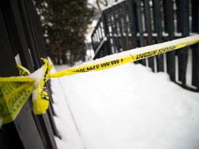 Two women are dead and a man is in custody as the Ottawa police major crime unit investigates the city�s 23rd and 24th homicides of 2016 Saturday December 17, 2016.  Ashley Fraser/Postmedia