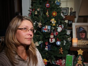 Tanya Gaston sits in her Alliston living room. Her husband, Geoff, was killed by drunk driver Marcello Fracassi, also of Alliston, on June 20, 2014.