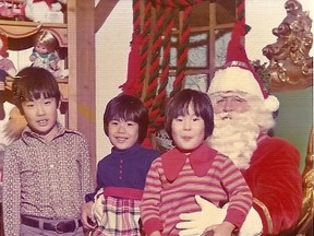 The Moritsugu family on year 7 of Santa visits. They still make the trek to see St. Nick for photos every year.