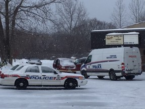 Police probe a stabbing death Sunday at the Imperio Banquet Hall on Falcon Street in east London. Police have not named the victim or the firm involved. (JOHN MINER, The London Free Press)