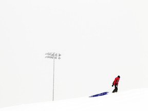 It was perfect weather to pull out the toboggans like this crew that hit Mooney's Bay hill for some sliding fun Saturday December 17, 2016. Ottawa is being hit with a winter snow storm blanketing the capital in a deep layer of snow.   Ashley Fraser/Postmedia